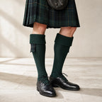 Heritage green Scottish kilt hose front view – premium Highland socks by Glenor Heritage