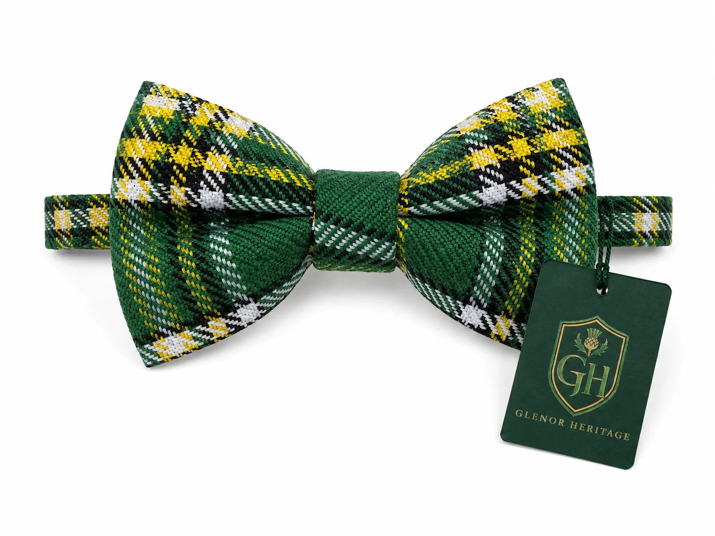 A green tartan plaid bow tie with yellow, white, and black stripes, featuring a matching green hangtag with the Glenoe Heritage logo.