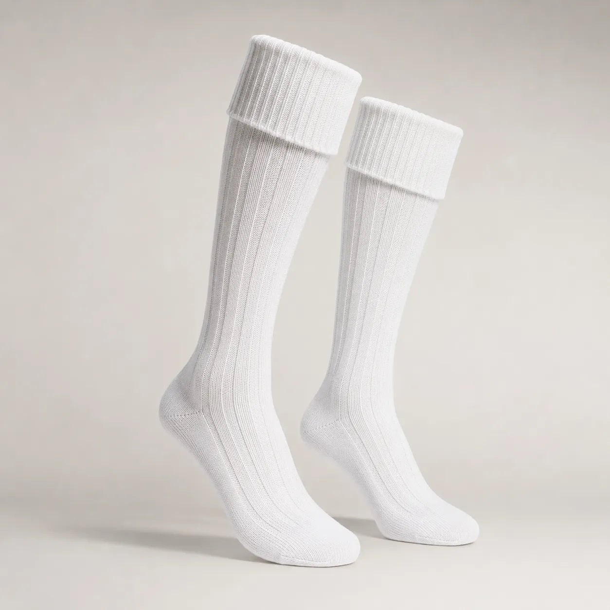 White Scottish kilt hose side view – traditional ribbed Highland socks for kilts and pipe band by Glenor Heritage